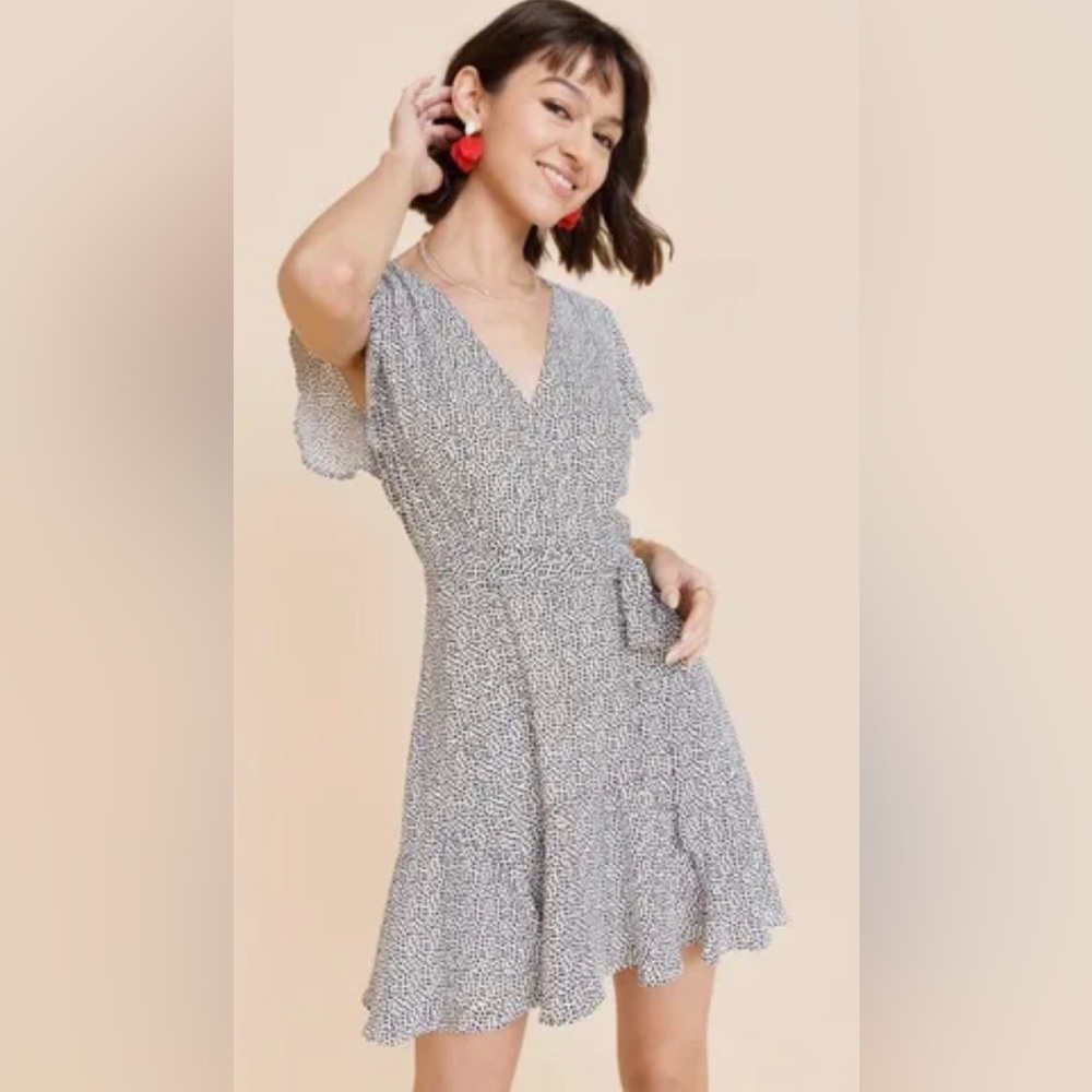 Cute sun dress for going out! Deep V-line, Black and white polkadot.